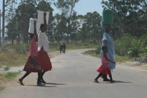 Women in Tafara carrying water